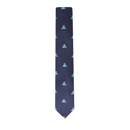 The Mountain Skinny Tie is a dark blue necktie with a stylish geometric design featuring pyramids in shades of blue and white, capturing the beauty of structured elegance.