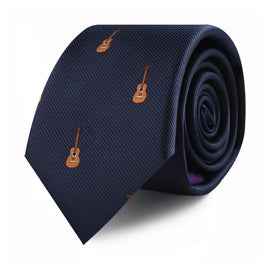A Guitar Skinny Tie with a pattern of small brown guitars, stylishly rolled up against a white background.
