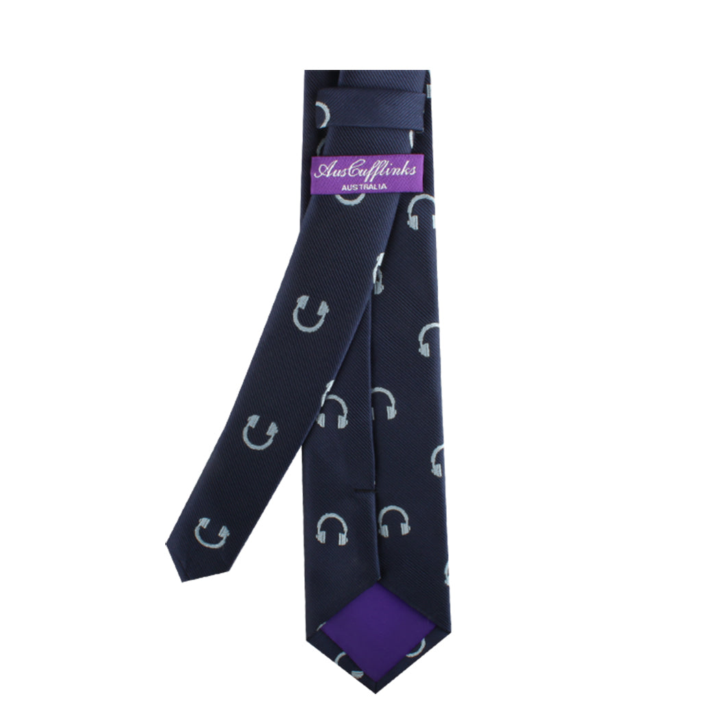 A Contemporary Headphone Skinny Tie with horseshoes on it.