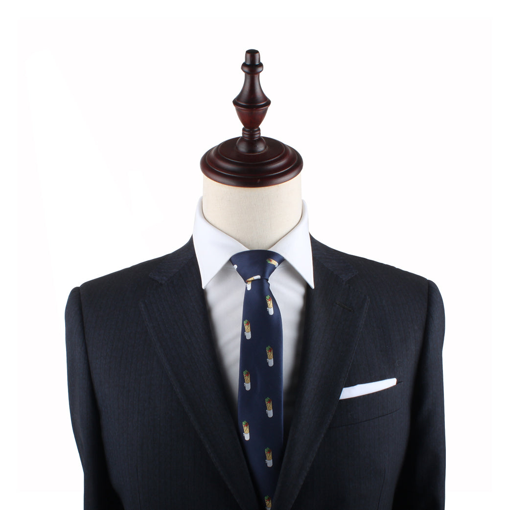 A mannequin dressed in a dark suit, white dress shirt, and the Kebab Skinny Tie savor the essence of timeless elegance.