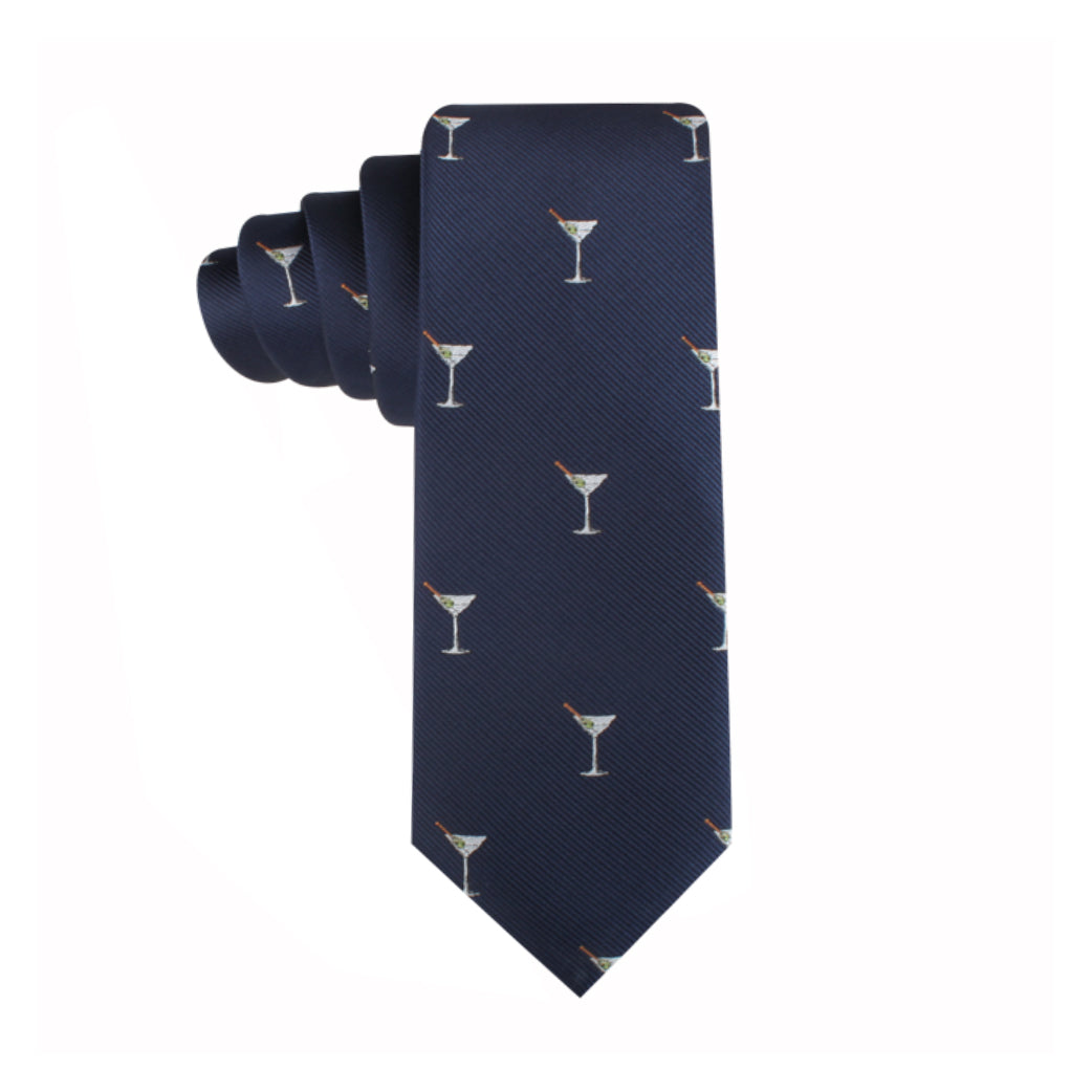 A Martini Skinny Tie in navy blue, featuring a classic pattern of martini glasses adorned with red olives.