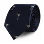 The Martini Skinny Tie is a dark blue necktie adorned with small embroidered martini glasses featuring green olives, adding a touch of classic class to any ensemble.