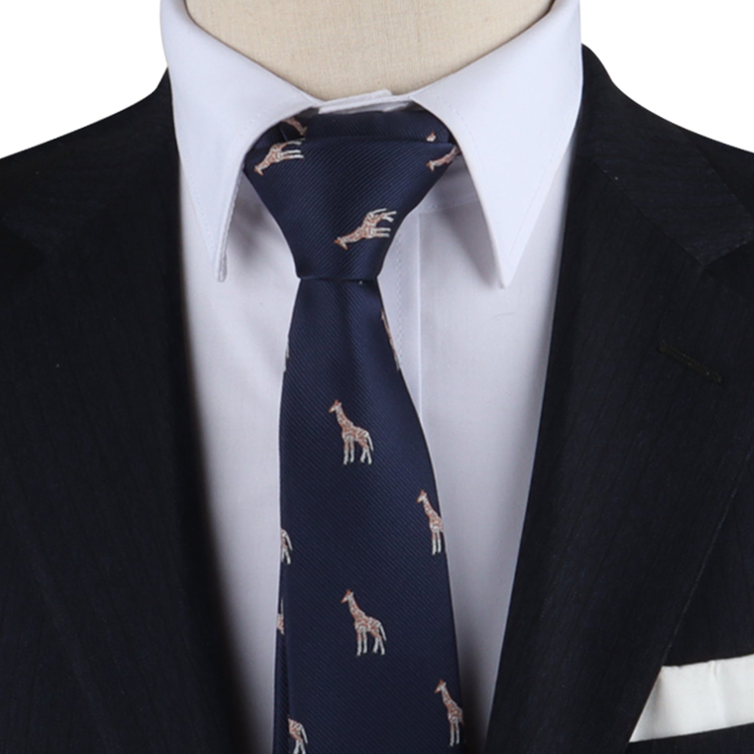 A person wearing a dark suit with a white shirt and the Giraffe Skinny Tie, showcasing small giraffe prints and exuding an air of sophistication that makes them stand tall.