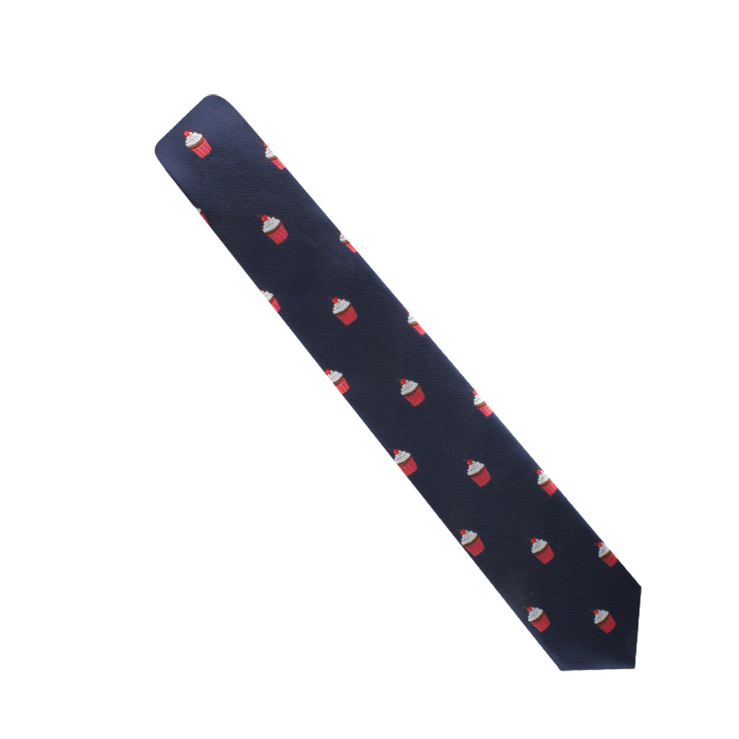 The Muffin Skinny Tie, featuring a black background adorned with a repeating pattern of red cups and white snowflakes, makes a delectable style statement.