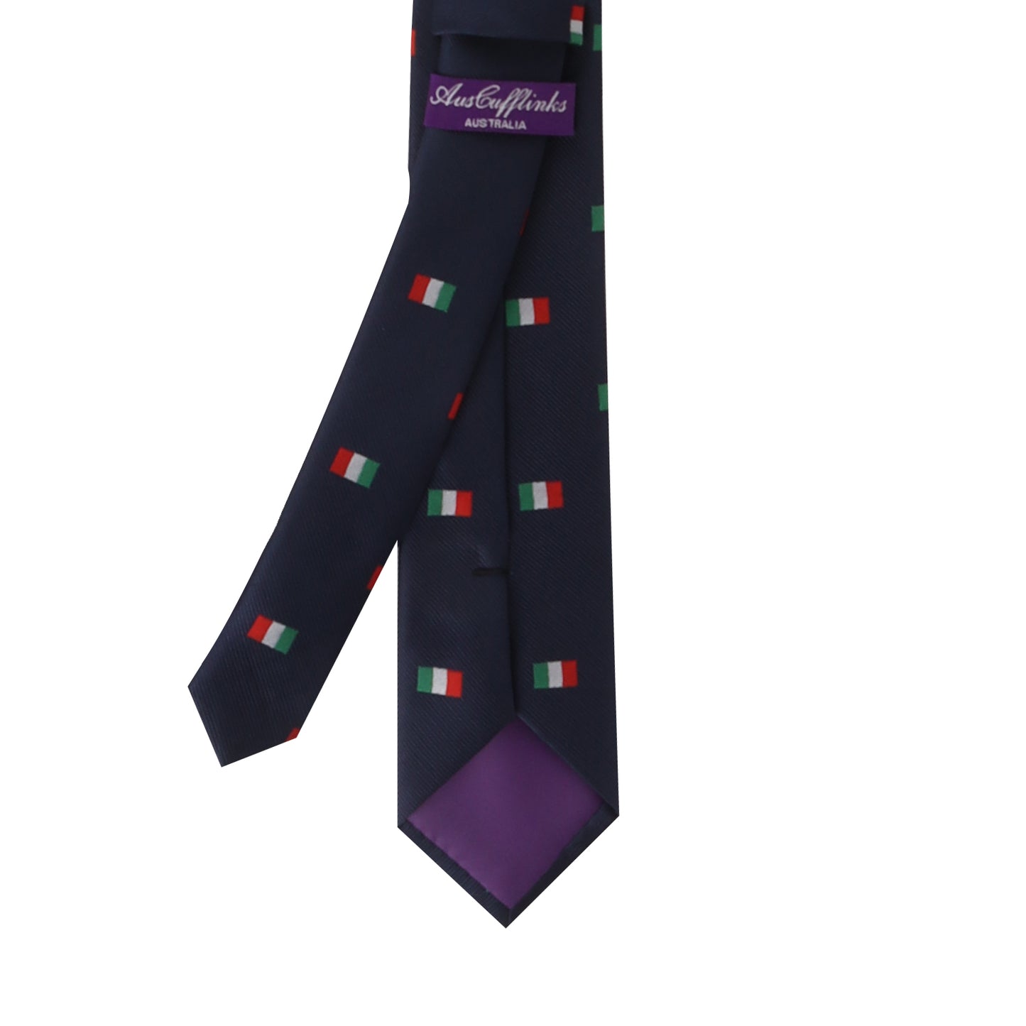 The Italian Mexican Flag Skinny Tie, featuring a dark blue design adorned with small Italian flag patterns and a purple lining on the back, captures an elegance that masterfully blends diverse cultures into a refined statement.