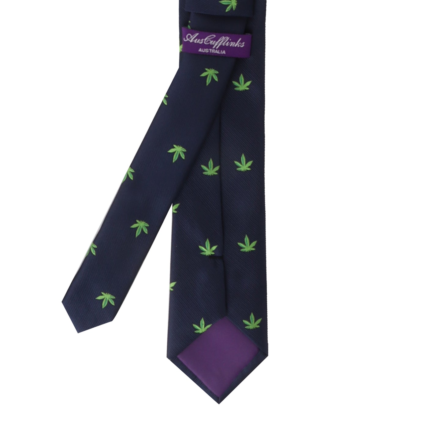 The Weed Skinny Tie, featuring a dark blue design with green leaf patterns, makes a bold statement, and the purple label marked "AussieCufflinks Australia" adds a touch of distinction.