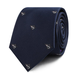 Great White Shark Skinny Tie in a dark blue shade, featuring small embroidered designs that exude elegance and intrigue, neatly rolled.