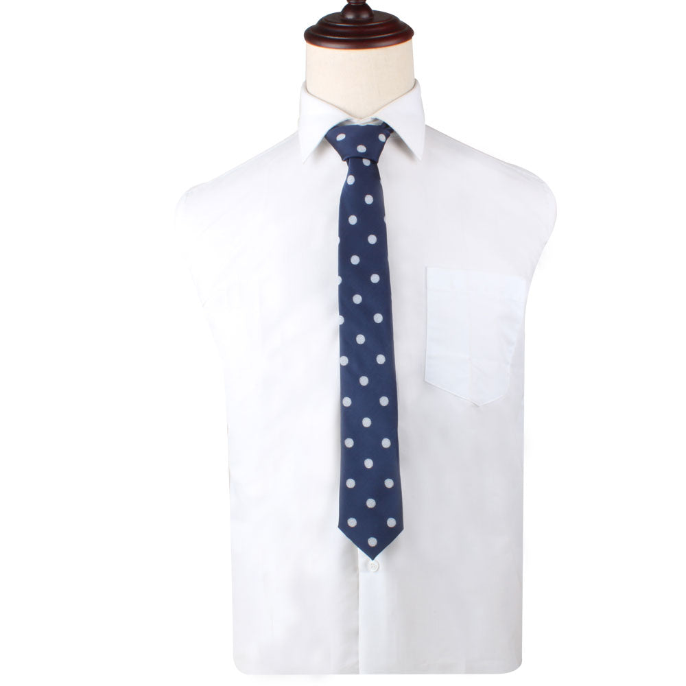 A mannequin torso showcases a white dress shirt featuring a single chest pocket, paired with the Golf Ball Skinny Tie, perfect for sport enthusiasts looking to add subtle elegance to their attire.