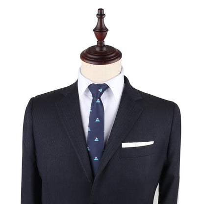 Mannequin dressed in a dark navy suit, white dress shirt, and Mountain Skinny Tie, exuding a timeless style against the plain background.