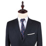 A stylish dark gray pinstripe suit on a wooden mannequin, featuring a white dress shirt, the Scuba Diver Skinny Tie in blue, and a white pocket square that adds an element of intrigue.