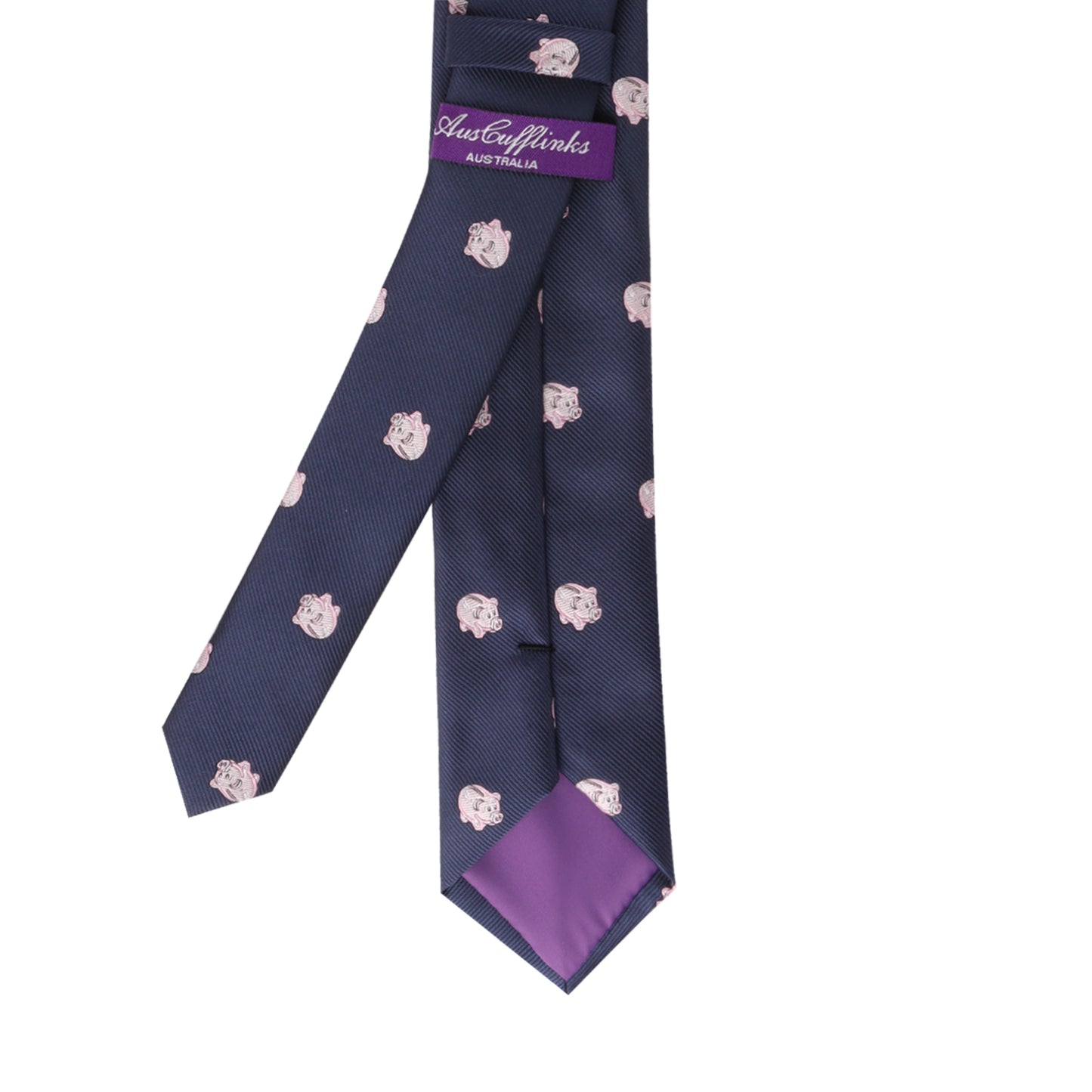 A Piggy Bank Skinny Tie with small pink pig-faced designs, featuring a purple label reading "Astor Family Australia" and a purple lining at the tip. Invest in this piece for a touch of sophistication that guarantees you'll standout.