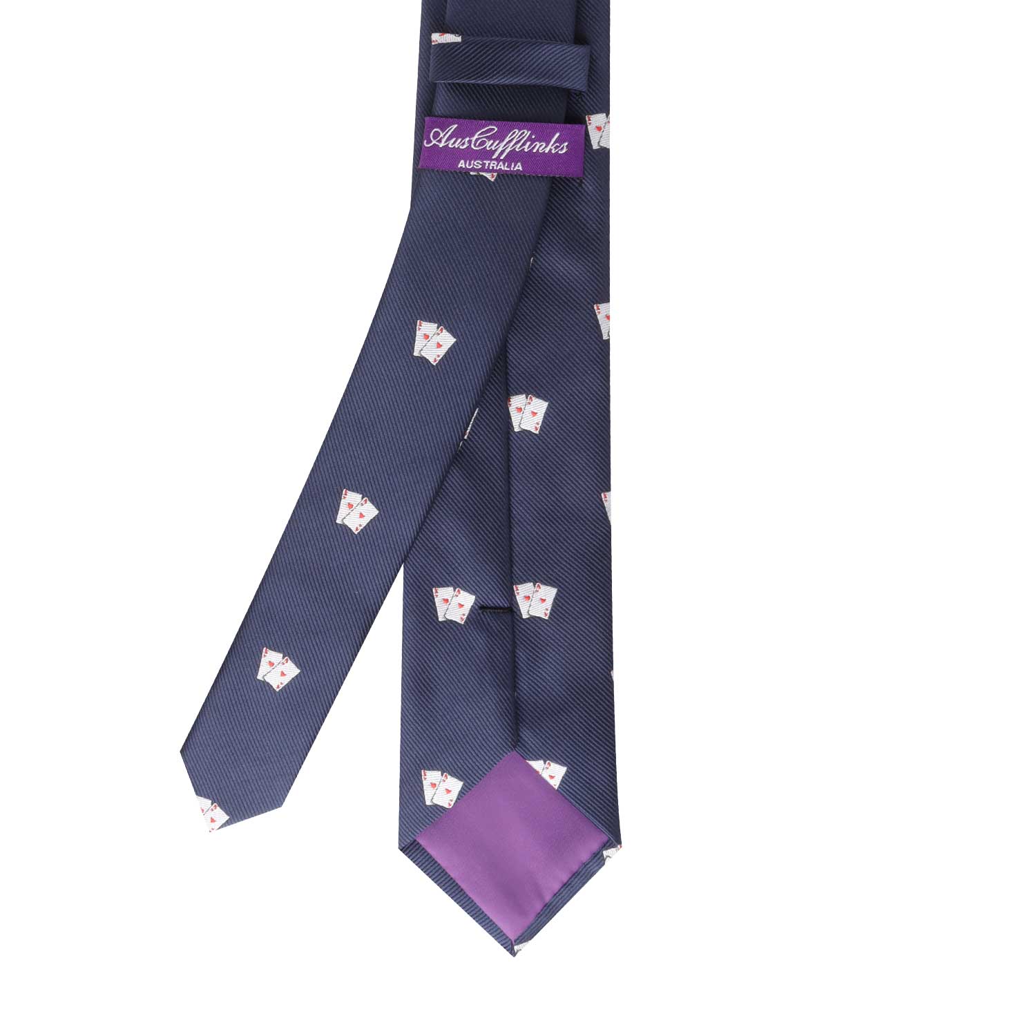 Introducing the Poker Cards Skinny Tie: a navy blue tie adorned with playful card motifs and complemented by a purple inner lining. Hung flat with the branded label visible, it is designed to elevate your style effortlessly.