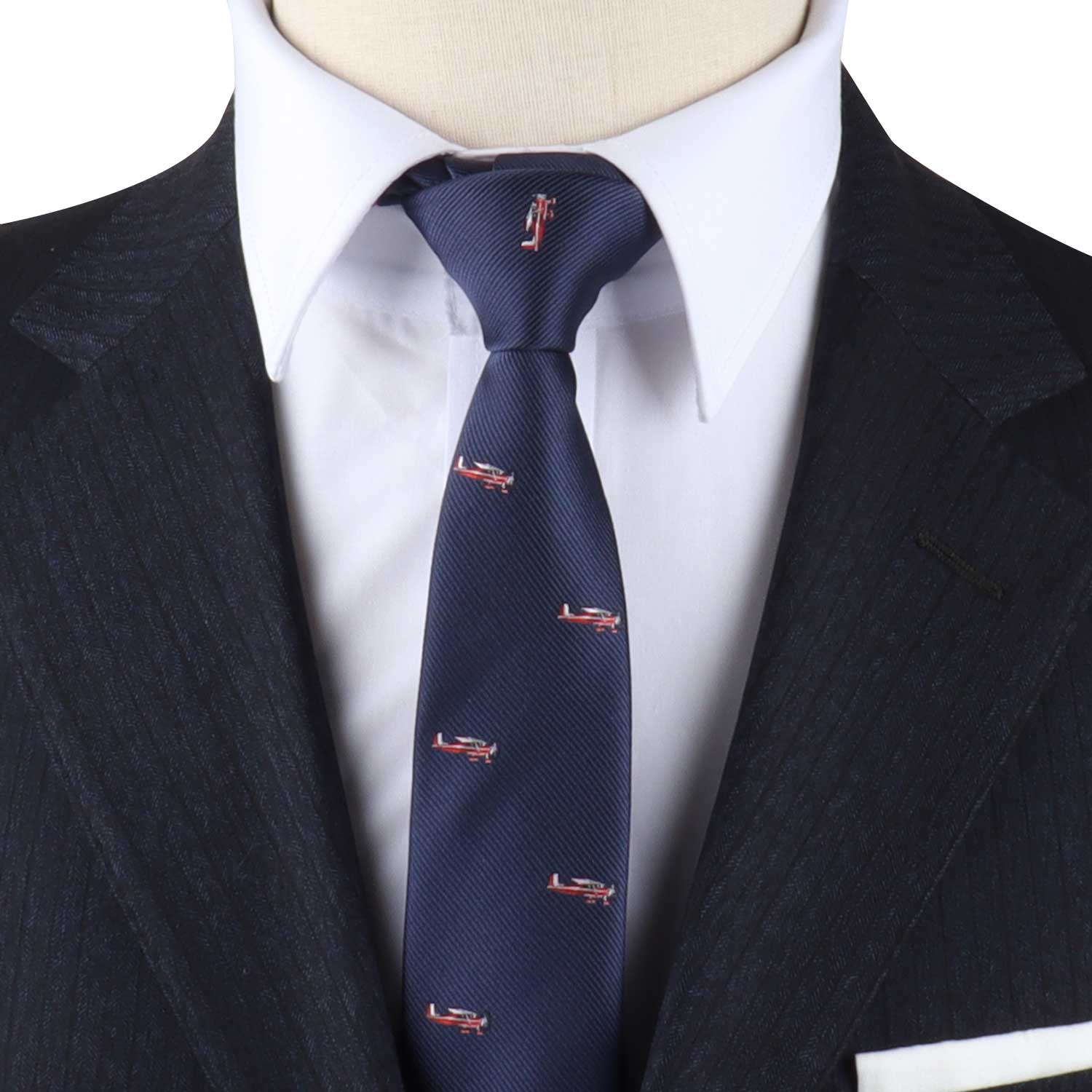 A timeless mannequin dressed in a fashion suit with a Airplane Lover Tie.