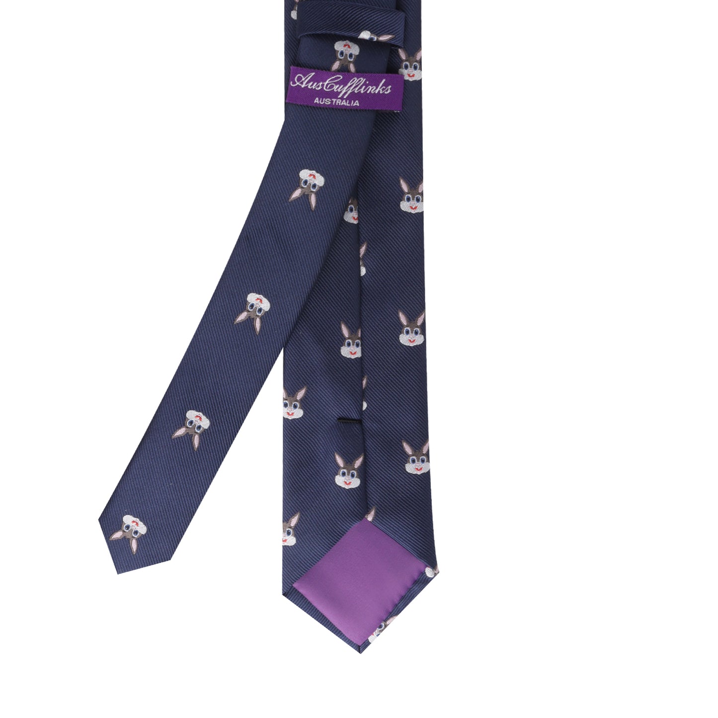 A tie with a pattern of cartoon koalas in navy blue, featuring a purple tag labeled "AusCufflinks Australia," effortlessly blends charming sophistication into your attire. The lining is also purple, adding an extra touch of elegance to this delightful accessory known as the Animal Themed Tie