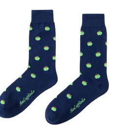 A pair of Apple Socks with green polka dots.