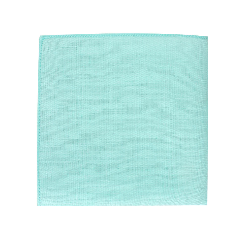 A cool Aqua Skinny Necktie and Pocket Square Set on a white background, seamlessly pairing with any outfit.