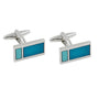 Introducing the Aqua Rectangle Cufflinks: These rectangular cufflinks feature silver frames and blue enamel insets, showcasing a geometric design with both a small light blue rectangle and a larger dark blue rectangle. Perfect for adding a touch of oceanic elegance and sophistication to any outfit.