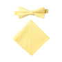 The Baby Yellow Cotton Bow Tie & Pocket Square Set exudes youthful charm against the white background.