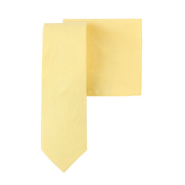 A Baby Yellow Cotton Skinny Cotton Tie & Pocket Square Set on a white background.