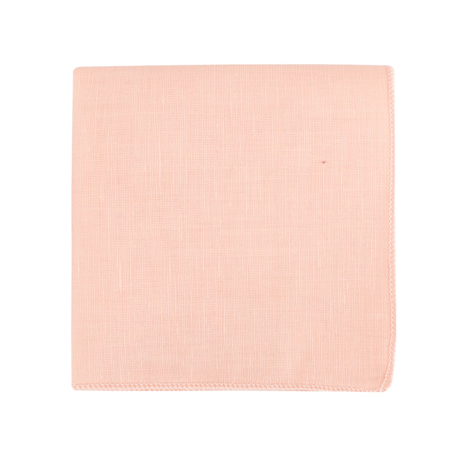 A folded piece of fabric in a gentle pastel peach hue is presented against a white backdrop, suggesting a dual-style ensemble. Introducing the Baby Pink Bow Tie and Pocket Square Set.