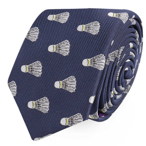 A rolled-up navy blue Badminton Skinny Tie featuring a repeated pattern of white and yellow shuttlecocks that looks sharp enough to score compliments.
