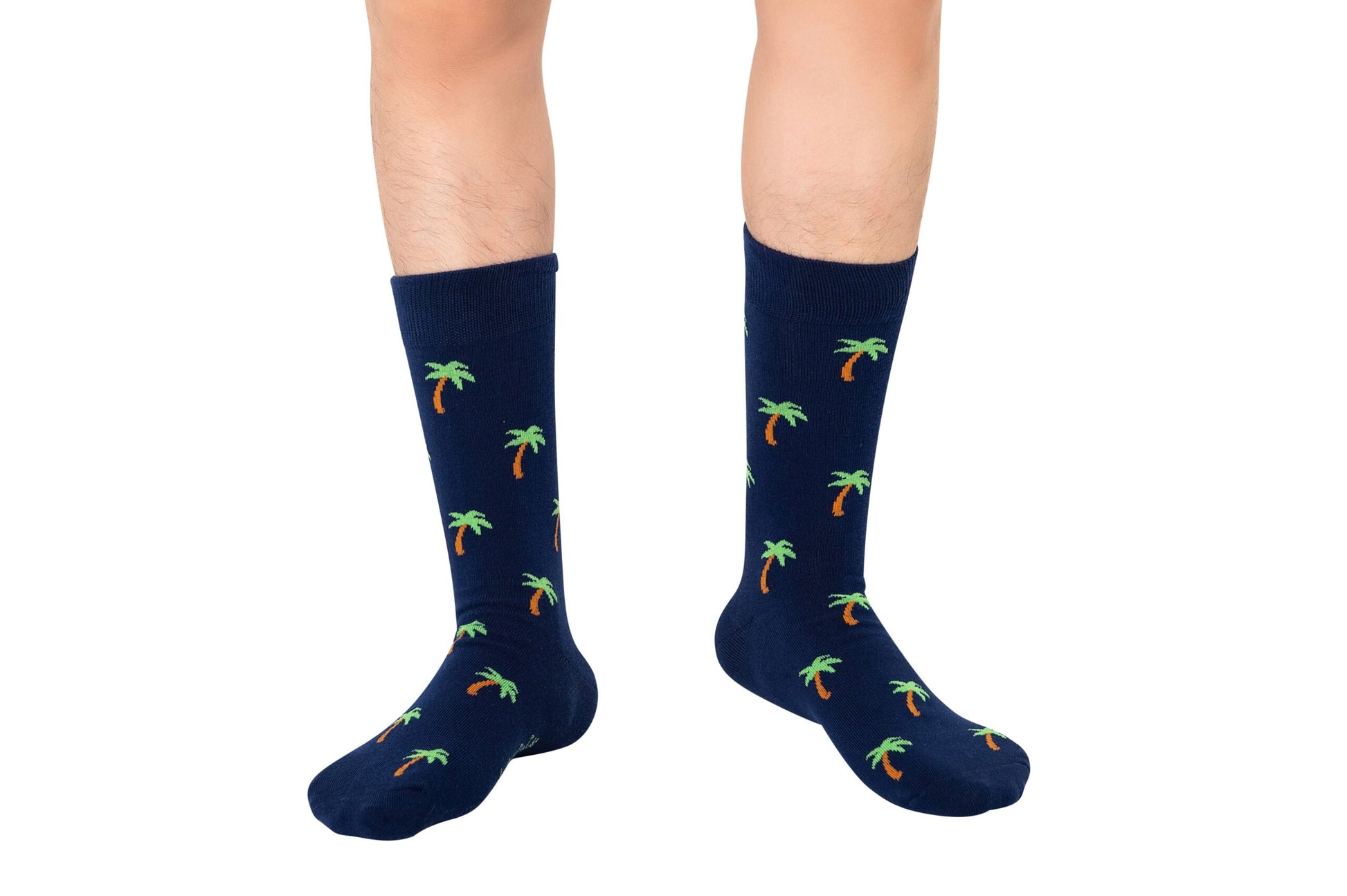 Person rocking Beachwear Socks in navy blue, bringing serious tropical vibes to their toes.