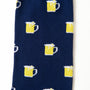 Beer Socks are navy blue with a playful pattern of yellow beer mugs topped with white foam, perfect for beer lovers.