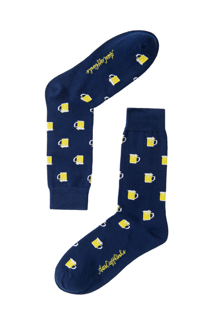 Beer Socks: Navy blue socks with a repeating yellow beer mug pattern and script text near the toe and sole—perfect for beer lovers.