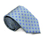 The Blue Flower Grey Skinny Tie elegantly showcases a blue floral charm on a refined gray background.