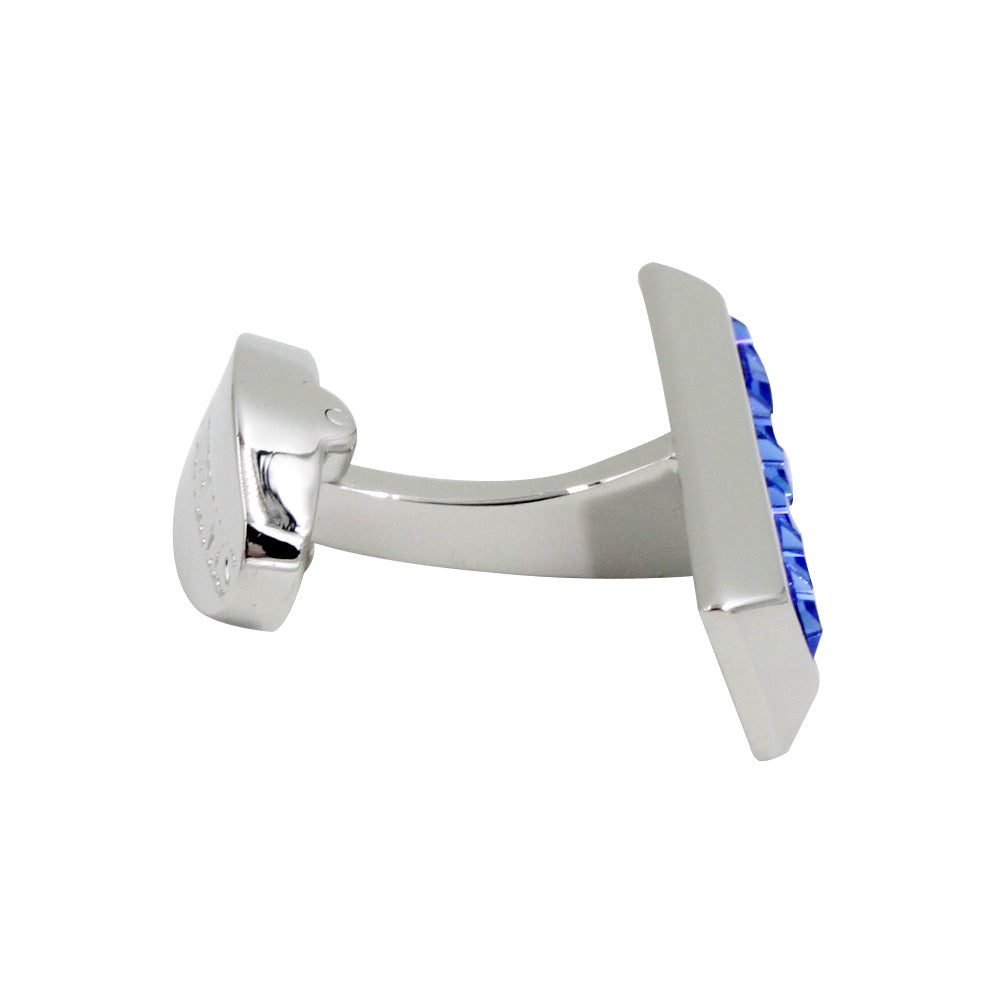 Side view of the Blue Ice Cufflinks, showcasing their silver rectangular face with striking blue accents.