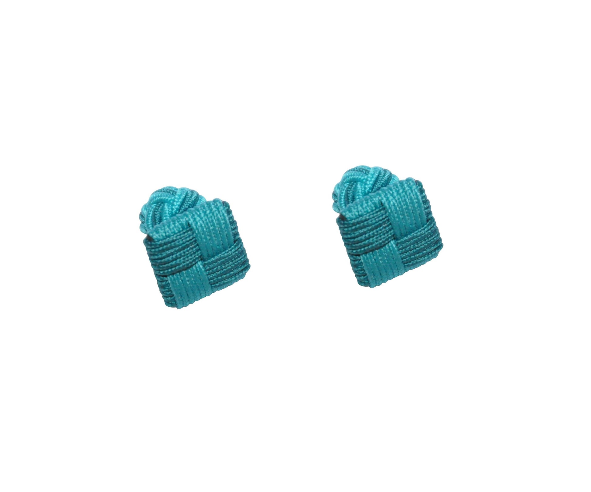 Two teal woven fabric knots exude timeless elegance, reminiscent of the classic style of Turquoise Square Cufflinks, against a white background.