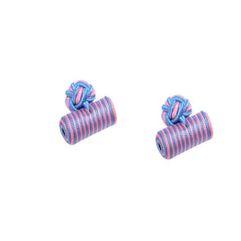 The Blue & Pink Barrel Cufflinks, featuring striped, cylindrical designs with knotted tops, rest on a white background, showcasing a harmonious blend of hues for an elegant finish.