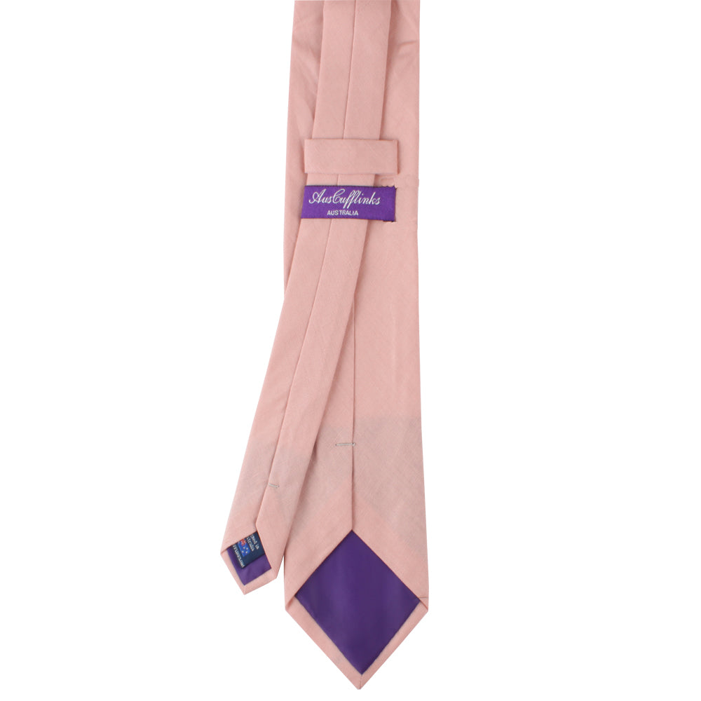 A Blush Pink Skinny Tie on a white background.