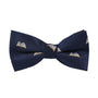 The Book Bow Tie is a dark blue masterpiece adorned with a pattern of small open books, perfect for those who want to script their style.