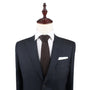 A Brown Knit  Tie on a mannequin.
