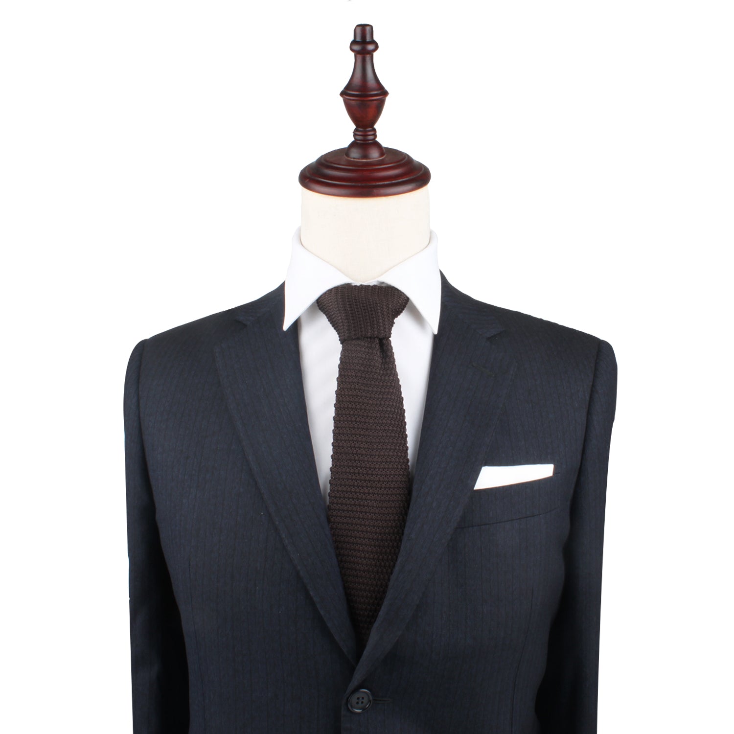 A Brown Knit  Tie on a mannequin.