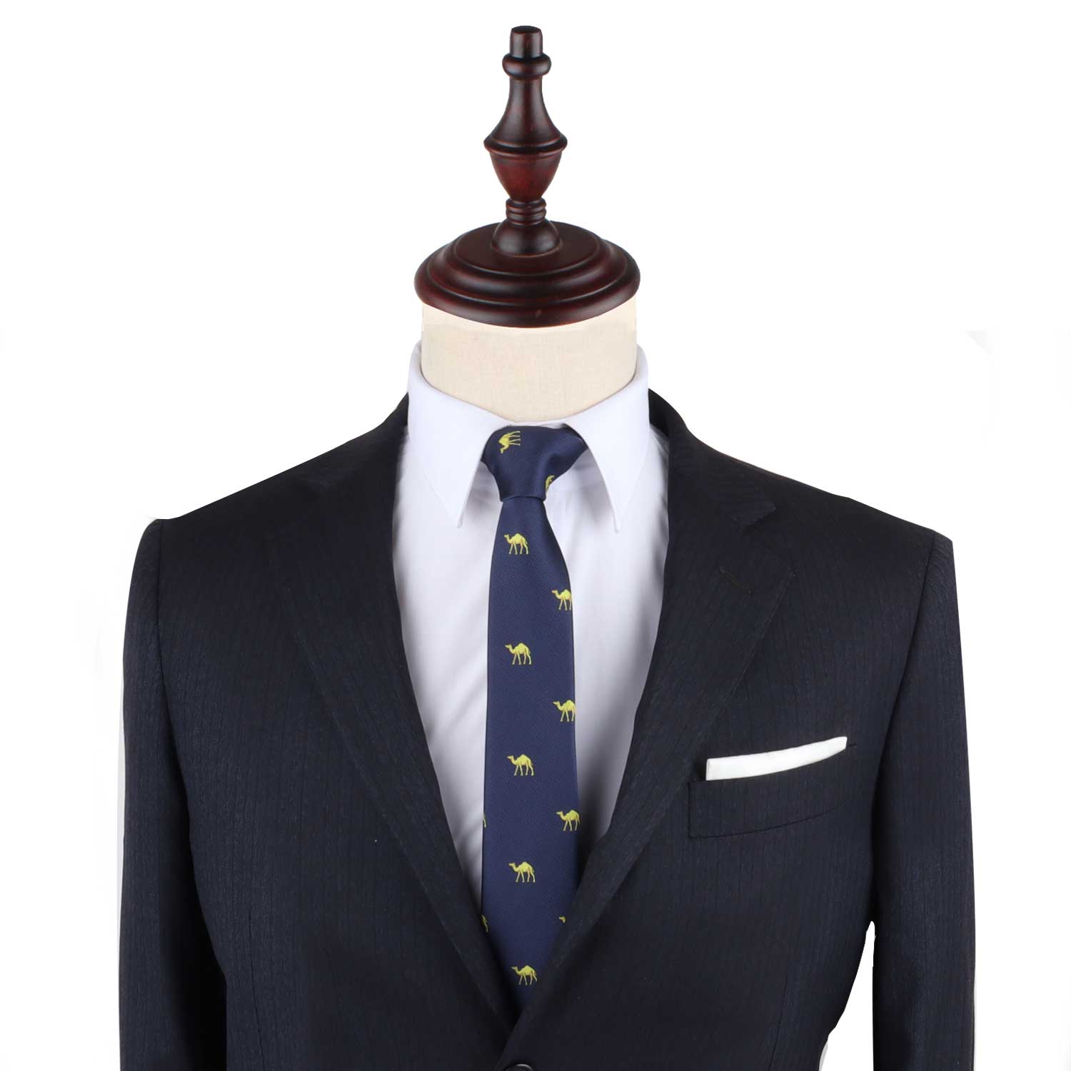 A suit with a Camel Print Necktie and pocket square on a mannequin, exuding urban elegance.