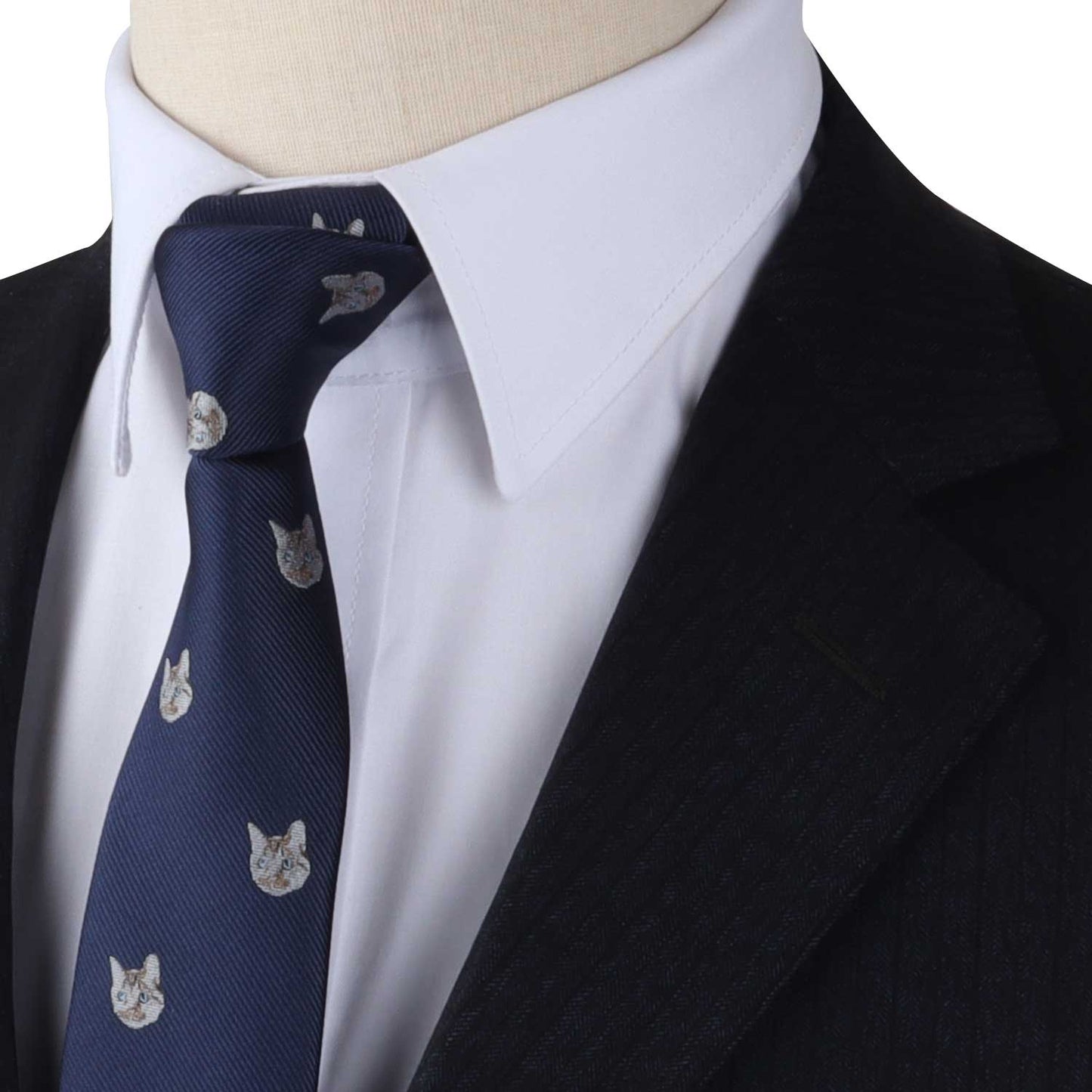 A mannequin wearing a Cat Print Tie blue suit and tie.