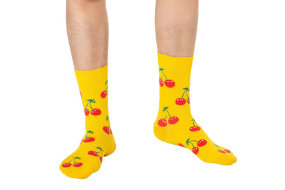 A pair of legs with Cherry Socks.