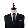 A modern suit and Chicken Slim Tie on a mannequin dummy.