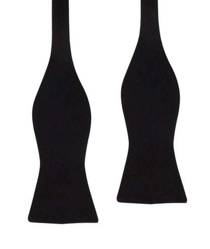 Two untied Classic Cotton Black Self-Tie Bow Ties lay on a white background, ready for formal events.