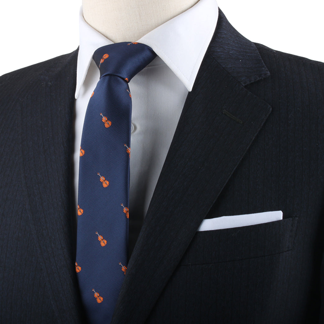 A melodic fashion tribute featuring a mannequin wearing a blue suit with a Classical Music Tie.