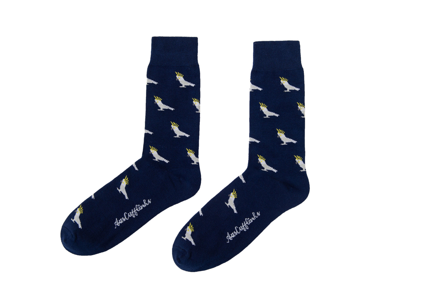 A pair of Cockatoo Socks, with white and yellow birds on them.