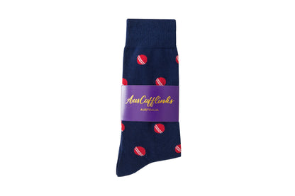 A Cricket Sock with red dots on it.