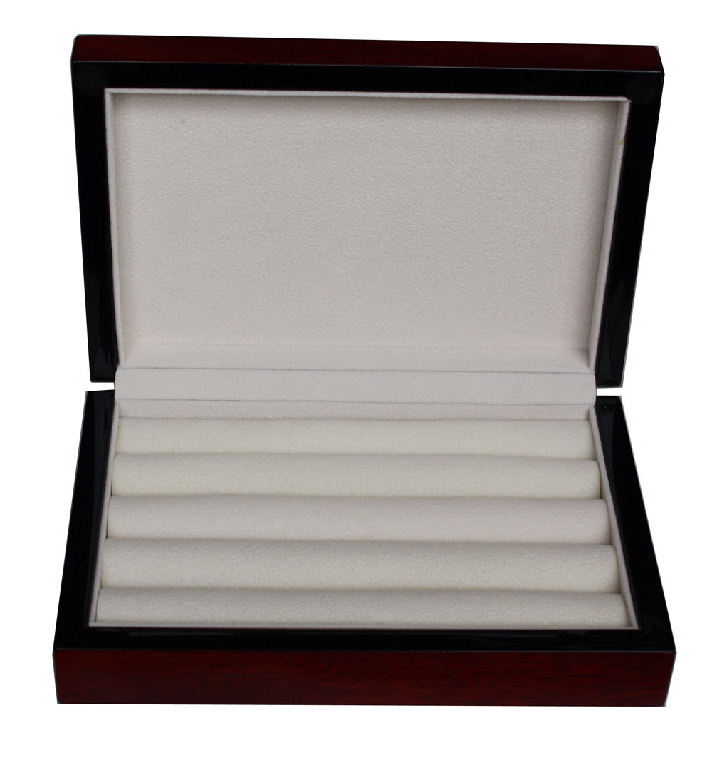 The Cherry Wood Cufflink Box features an open, empty design with a white padded interior and five slots—ideal for the modern gentleman to stylishly display or conveniently store cufflinks, rings, or pens.