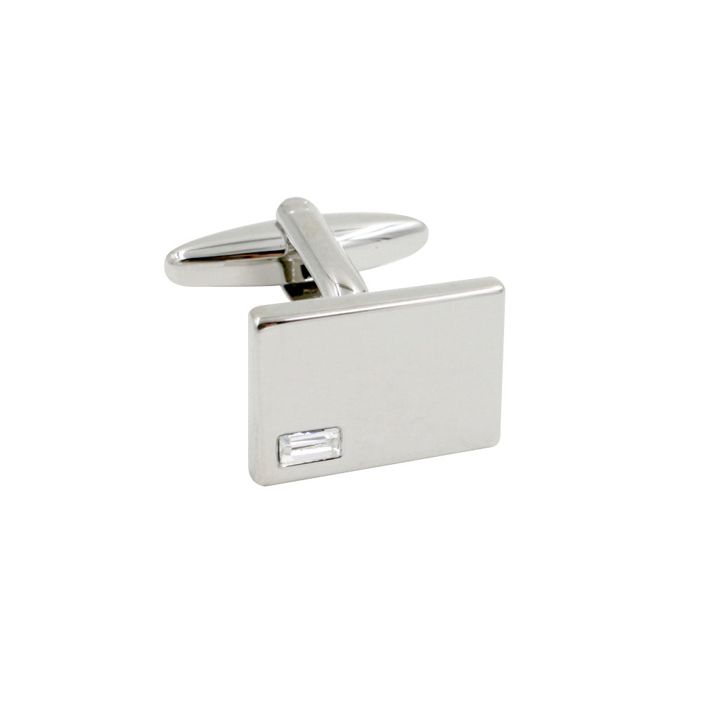 The Diamante Silver Stone Cufflinks are rectangular and crafted in shimmering silver, each featuring a small, elegant embedded stone on one side.