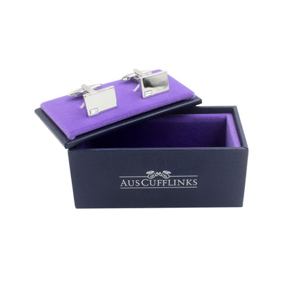 The Diamante Silver Stone Cufflinks shine elegantly on a purple velvet insert, nestled in an open black box labeled "AUSCufflinks.