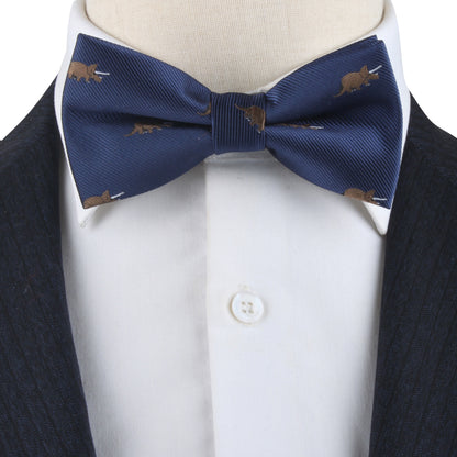 A Triceratops Bow Tie, exuding Jurassic charm, elegantly complements a crisp white shirt and a dark pinstripe suit.