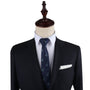 A black suit with a Dinosaur Skinny Tie on a mannequin dummy that exudes dino elegance.
