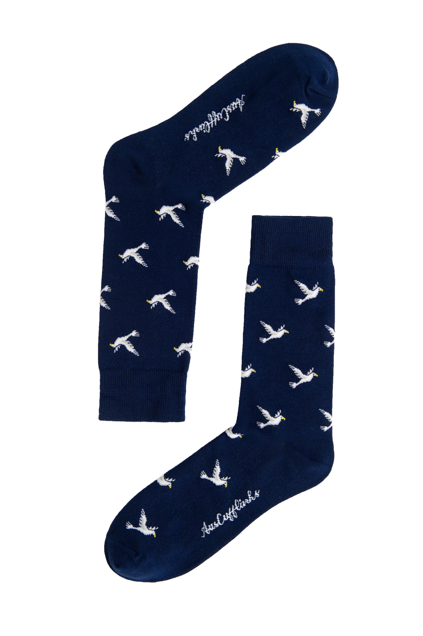 A pair of navy Dove socks with white birds on them.